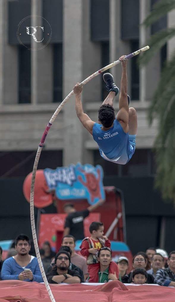 Founder competing in pole vault for El Salvador